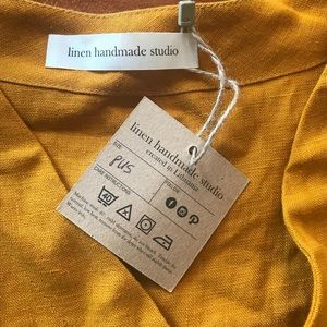 Hand made gold linen V-neck blouse.